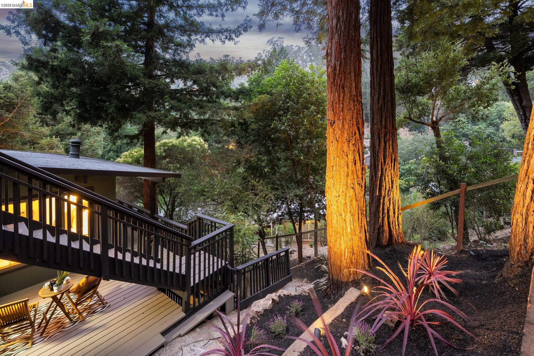 6645 Heather Ridge Way Oakland, CA 94611 - Photo 10 of 61 Multi-level dark wood exterior deck with integrated lighting