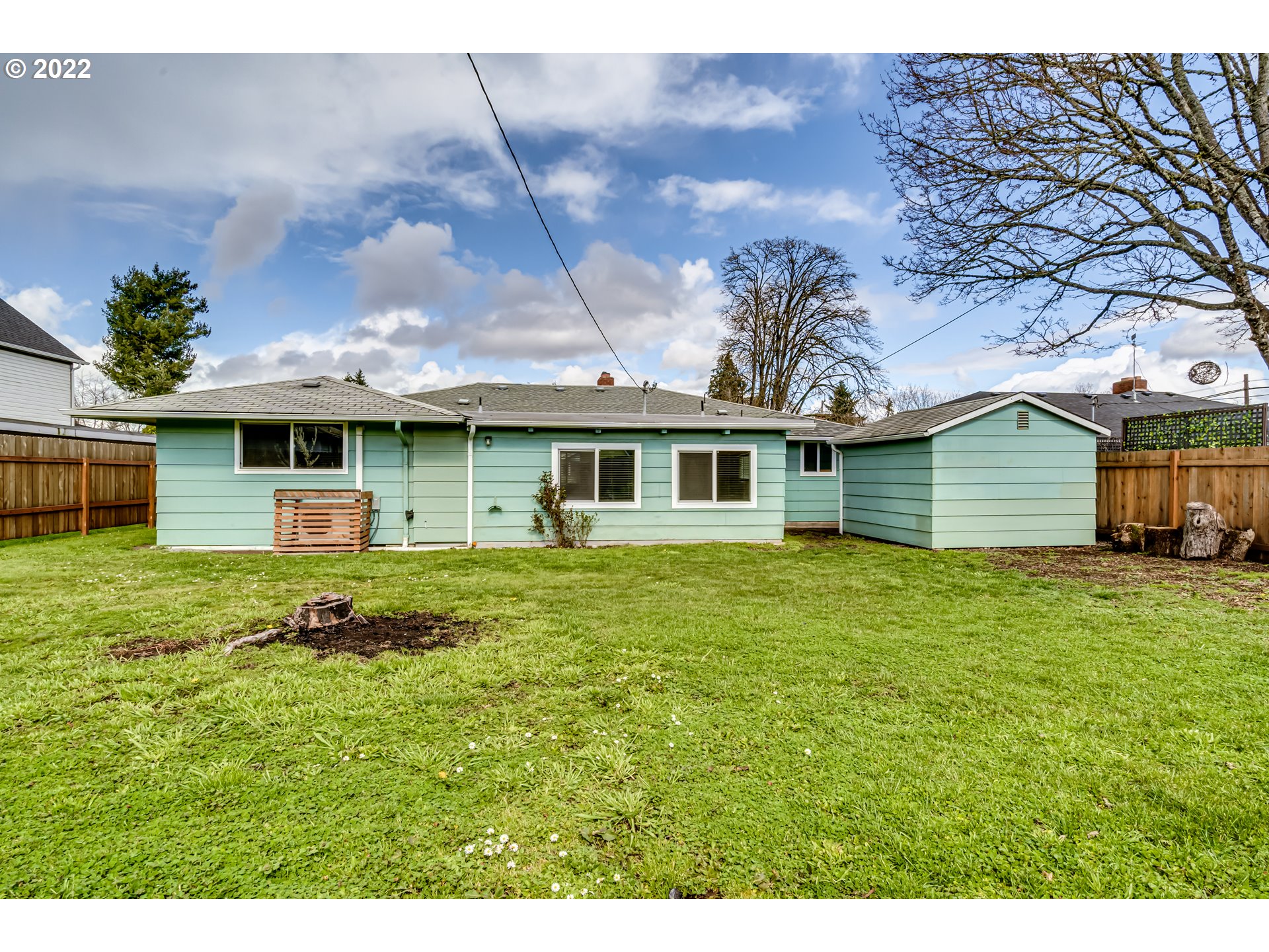 423 F Street Springfield, OR 97477 - Photo 23 of 29 a front view of a house with a garden