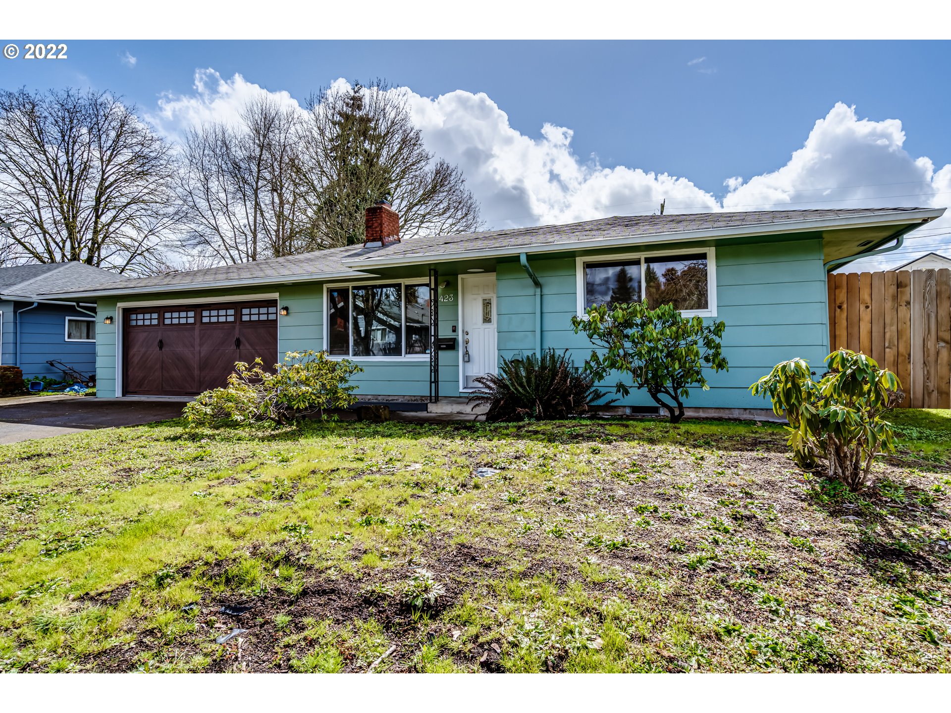 423 F Street Springfield, OR 97477 - Photo 29 of 29 a front view of a house with garden
