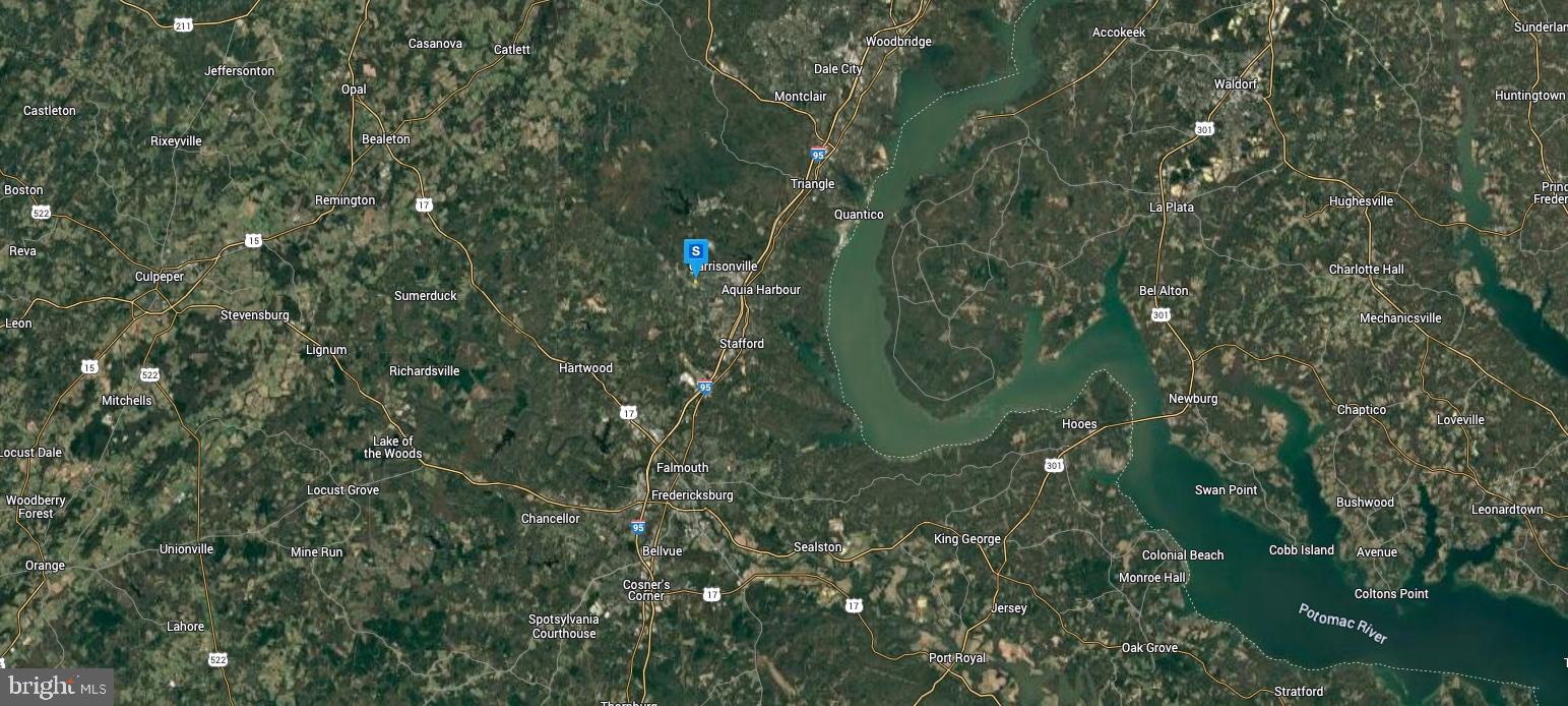 21 English Road Stafford, VA 22556 - Photo 6 of 6 a green field with lots of bushes