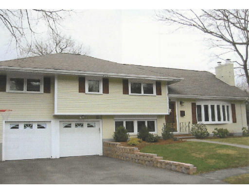 30 Fletcher Road Needham, MA 02492 - Photo 1 of 1 a front view of a house with a garden