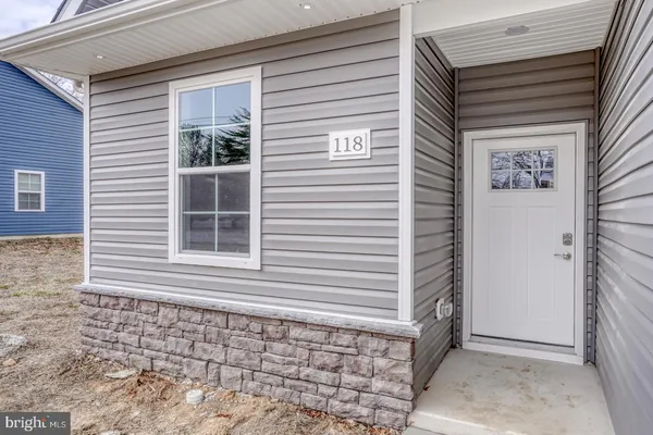 a view of a brick house with a window