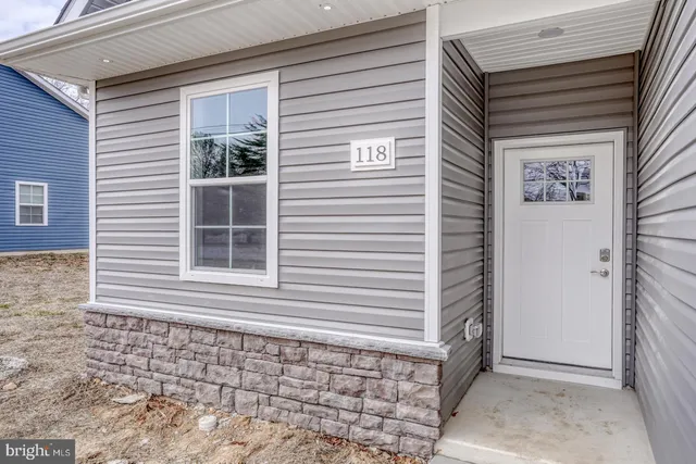 a view of a brick house with a window