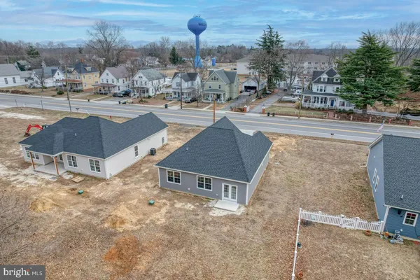 a view of a house with outdoor space and sitting area