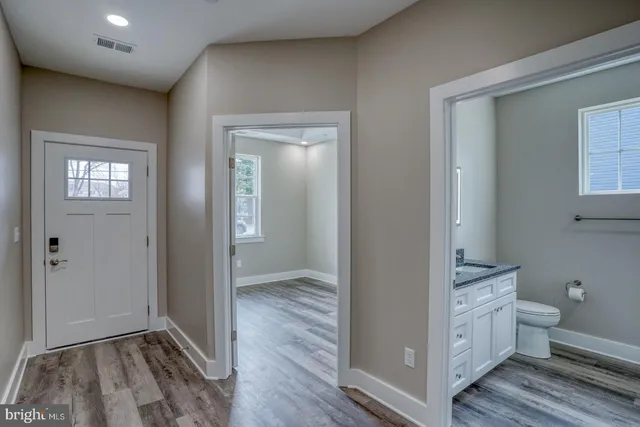 a view of bathroom with dual sinks