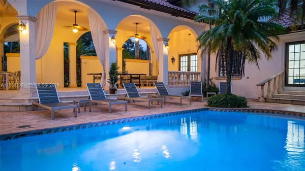 a view of a house with a swimming pool