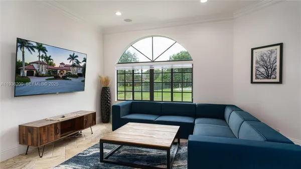 a backyard of a house with barbeque oven table and chairs