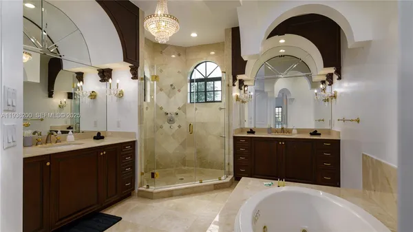 a bathroom with a granite countertop toilet a sink and a bathtub