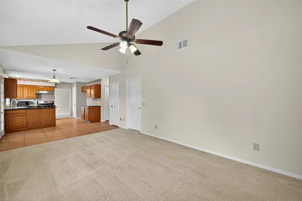a view of a kitchen with a sink and dishwasher