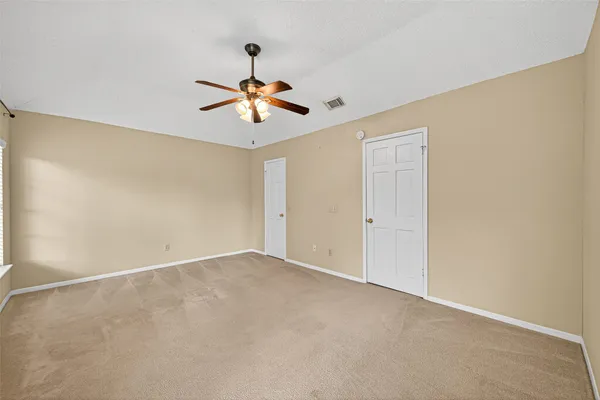 a bathroom with a sink a shower and a mirror