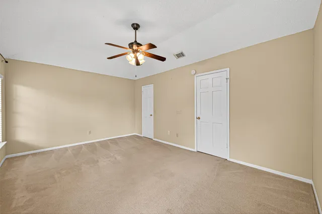 a bathroom with a sink a shower and a mirror