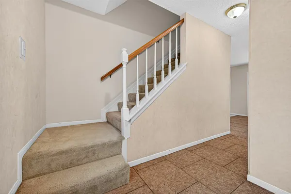 a view of an entryway with staircase