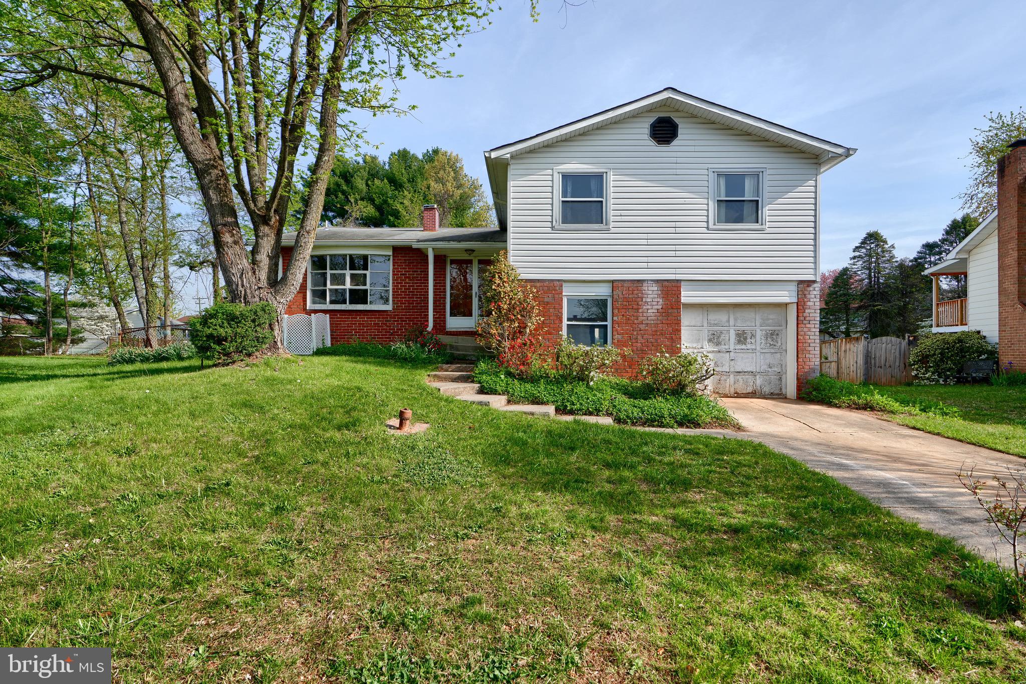 3902 Winlee Road Randallstown, MD 21133 - Photo 1 of 44 a front view of house with yard and green space