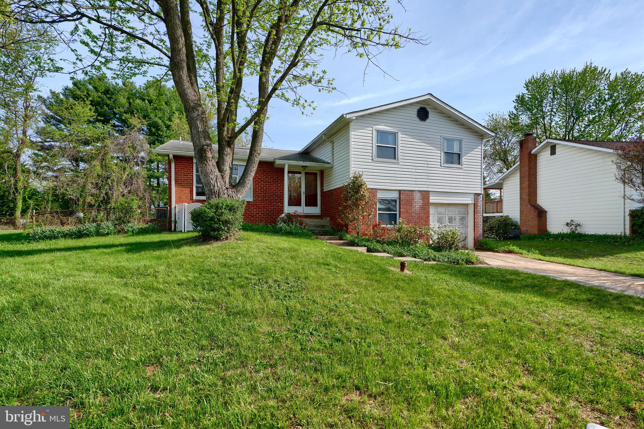 3902 Winlee Road Randallstown, MD 21133 - Photo 3 of 44 a front view of house with yard and green space