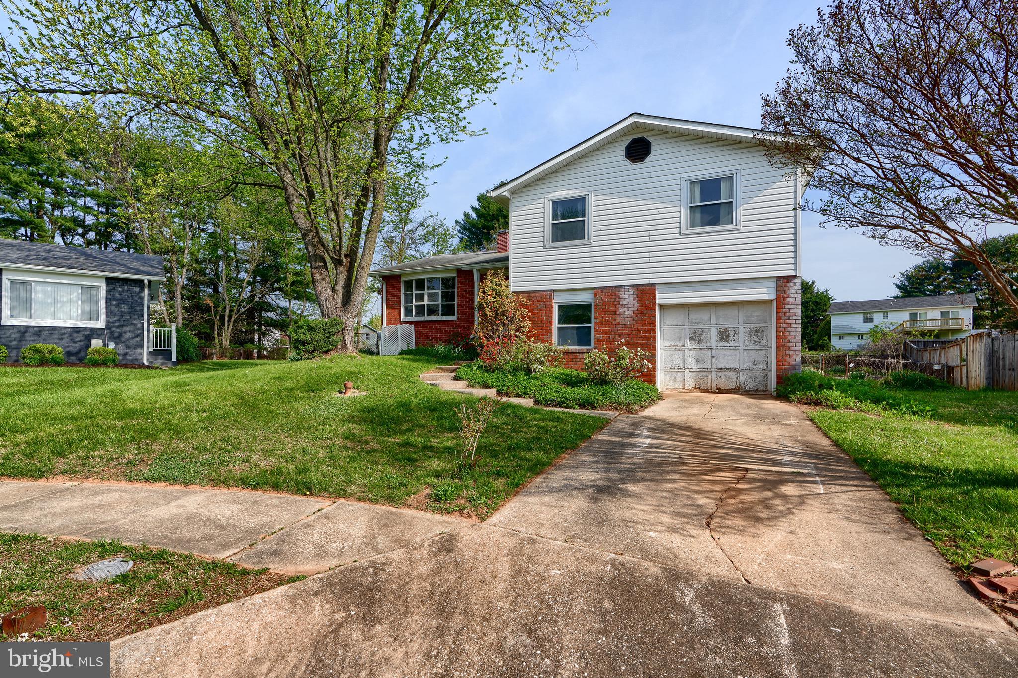 3902 Winlee Road Randallstown, MD 21133 - Photo 4 of 44 a front view of house with yard and green space