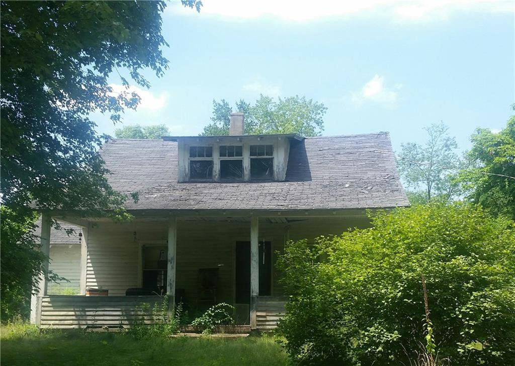 9 Genis Hill Road Granby, CT 06035 - Photo 1 of 1 a front view of a house with garden