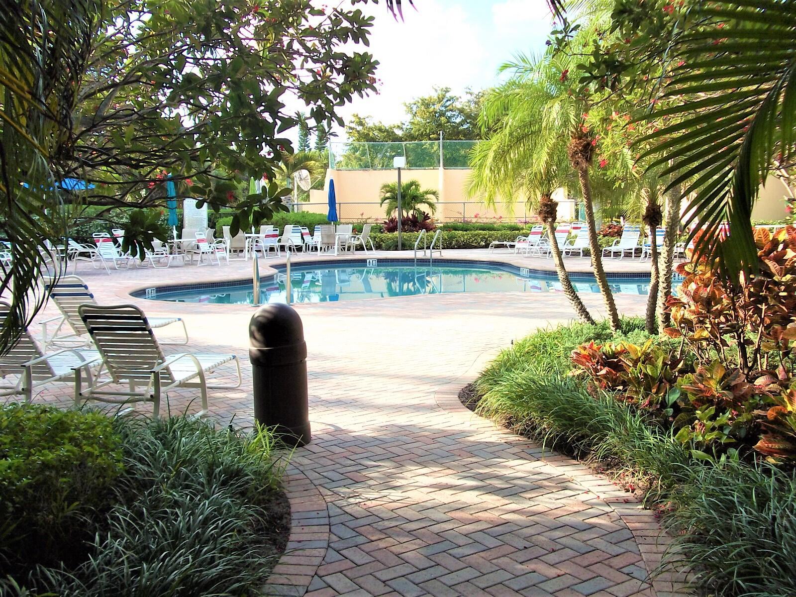 2455 Lindell Boulevard, Unit 3109 Delray Beach, FL 33444 - Photo 29 of 34 main pool nort hentrance