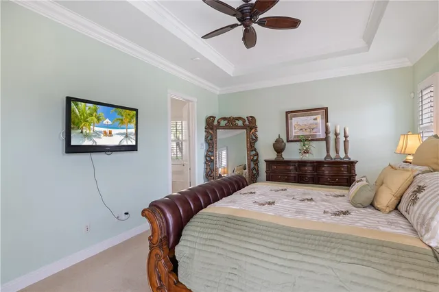 a bed room with a bed and a chandelier