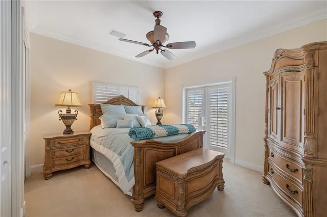 a bedroom with bed and a window