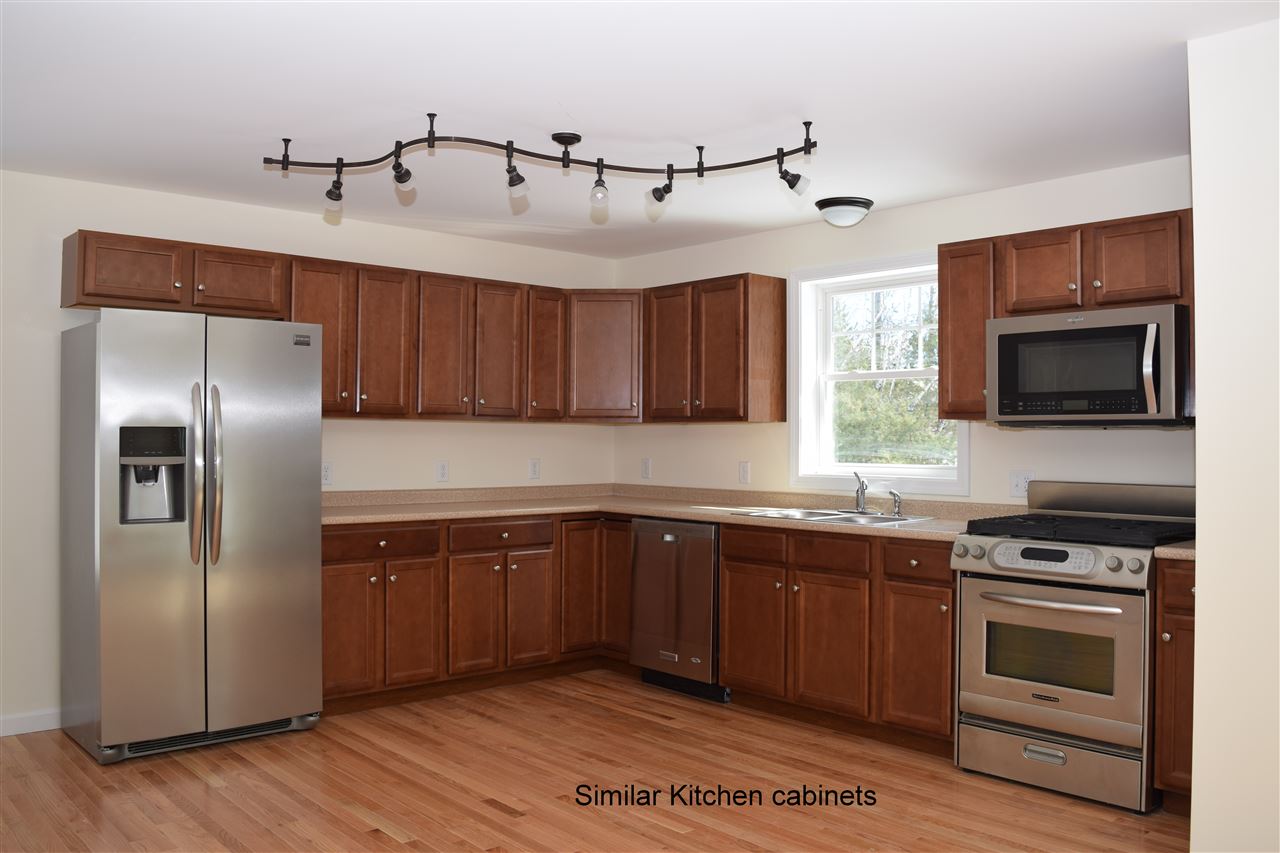 97 Miller's Farm Drive, Unit 14 Rochester, NH 03868 - Photo 2 of 10 Gallery Image 2