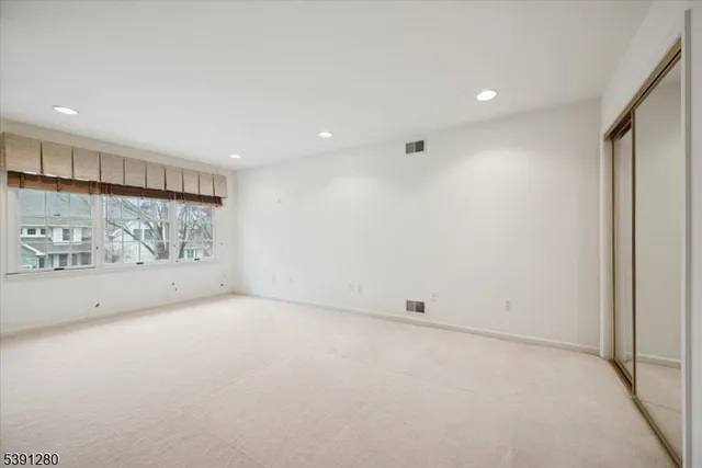 an empty room with window