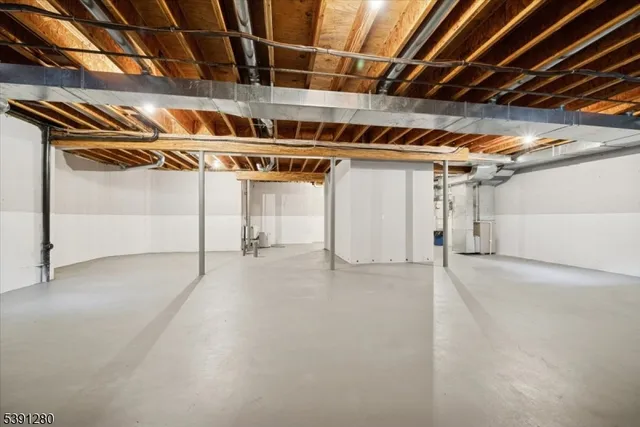 a view of a room with wooden walls