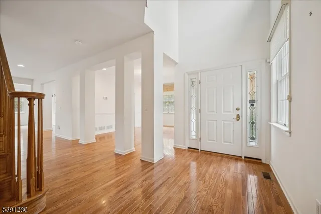 a view of entryway with wooden floor