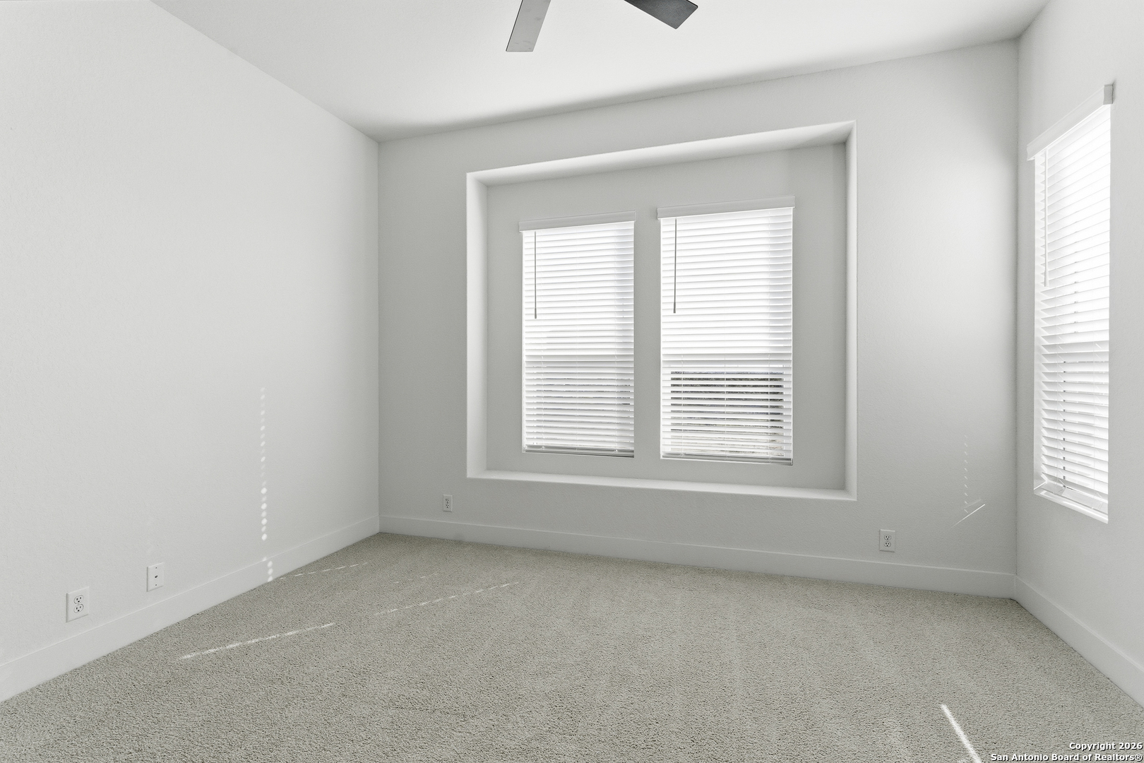 20675 Huebner Road, Unit 527 San Antonio, TX 78258 - Photo 22 of 43 an empty room with a window