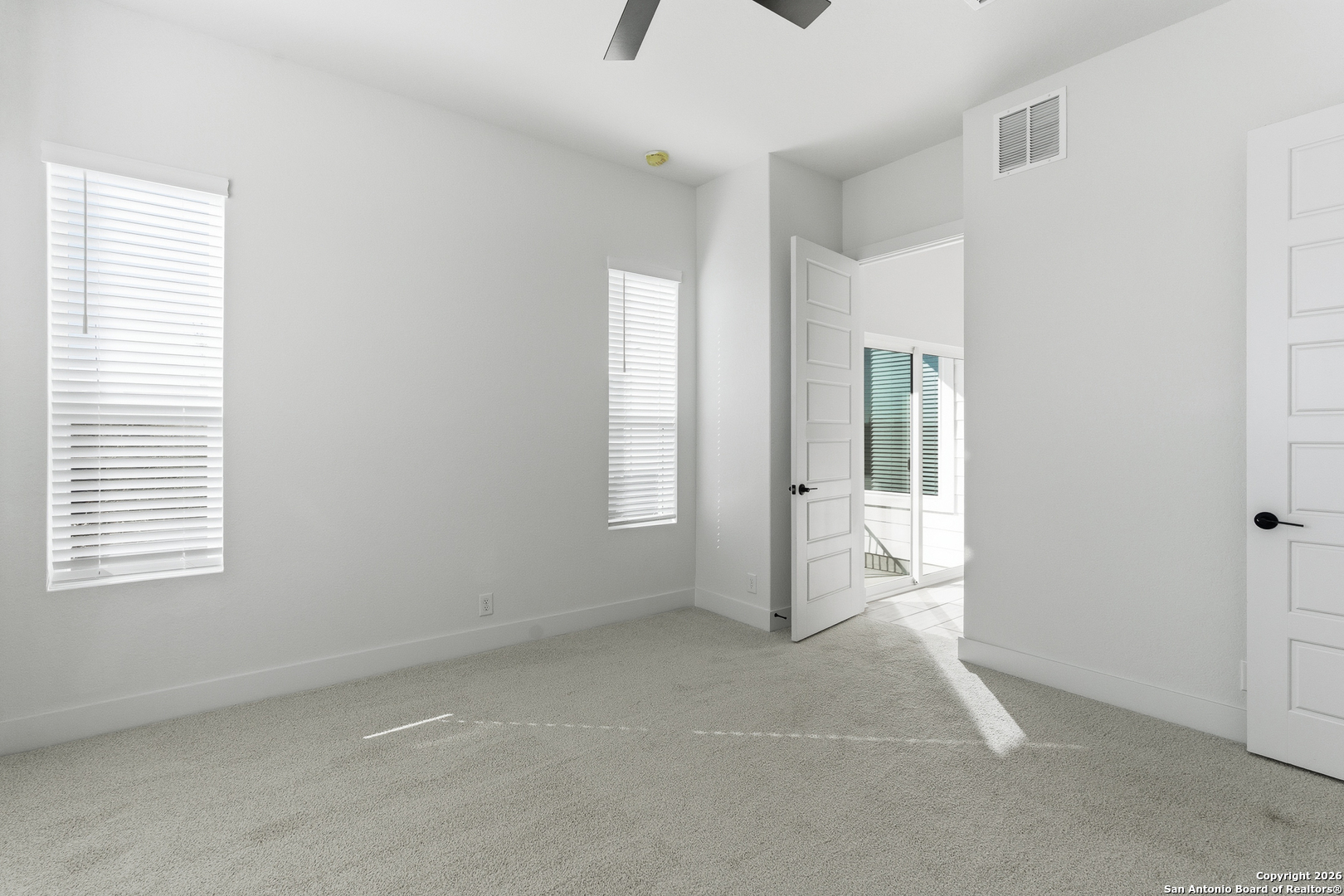 20675 Huebner Road, Unit 527 San Antonio, TX 78258 - Photo 23 of 43 a view of an empty room with a window