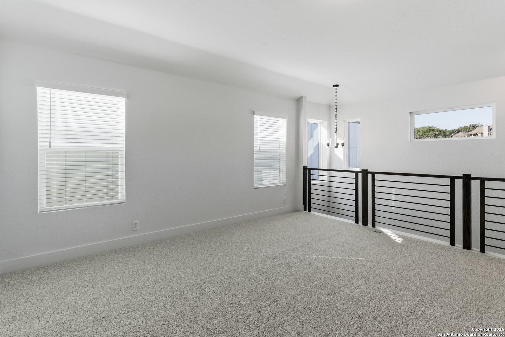 20675 Huebner Road, Unit 527 San Antonio, TX 78258 - Photo 27 of 43 a view of an empty room with a window