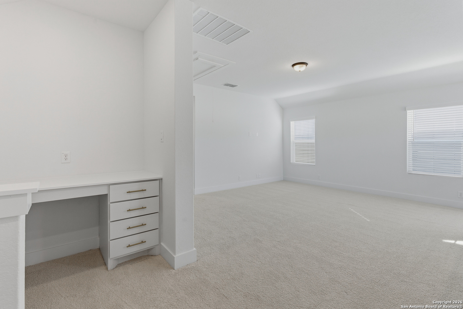 20675 Huebner Road, Unit 527 San Antonio, TX 78258 - Photo 29 of 43 wooden floor and cabinet in a room