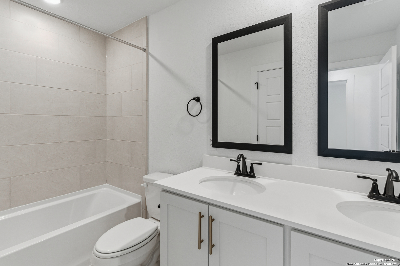 20675 Huebner Road, Unit 527 San Antonio, TX 78258 - Photo 34 of 43 a bathroom with a granite countertop sink toilet and shower