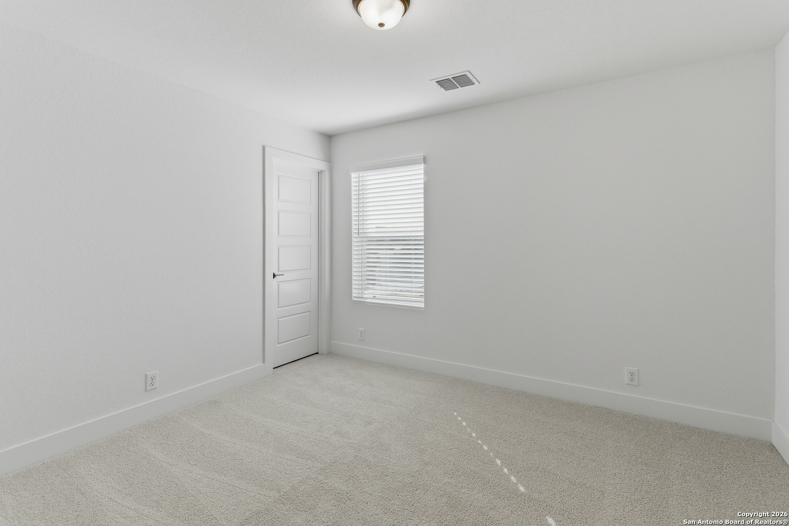 20675 Huebner Road, Unit 527 San Antonio, TX 78258 - Photo 35 of 43 an empty room with a window