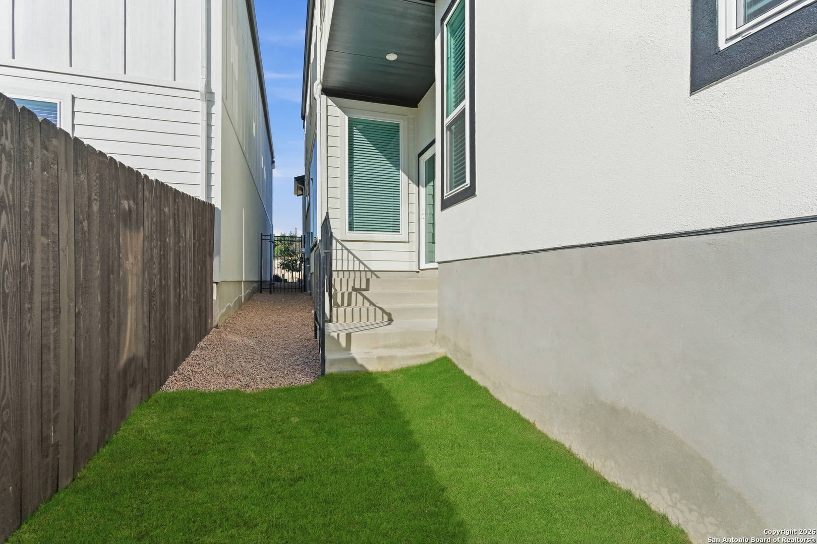 20675 Huebner Road, Unit 527 San Antonio, TX 78258 - Photo 36 of 43 a view of a house with a backyard