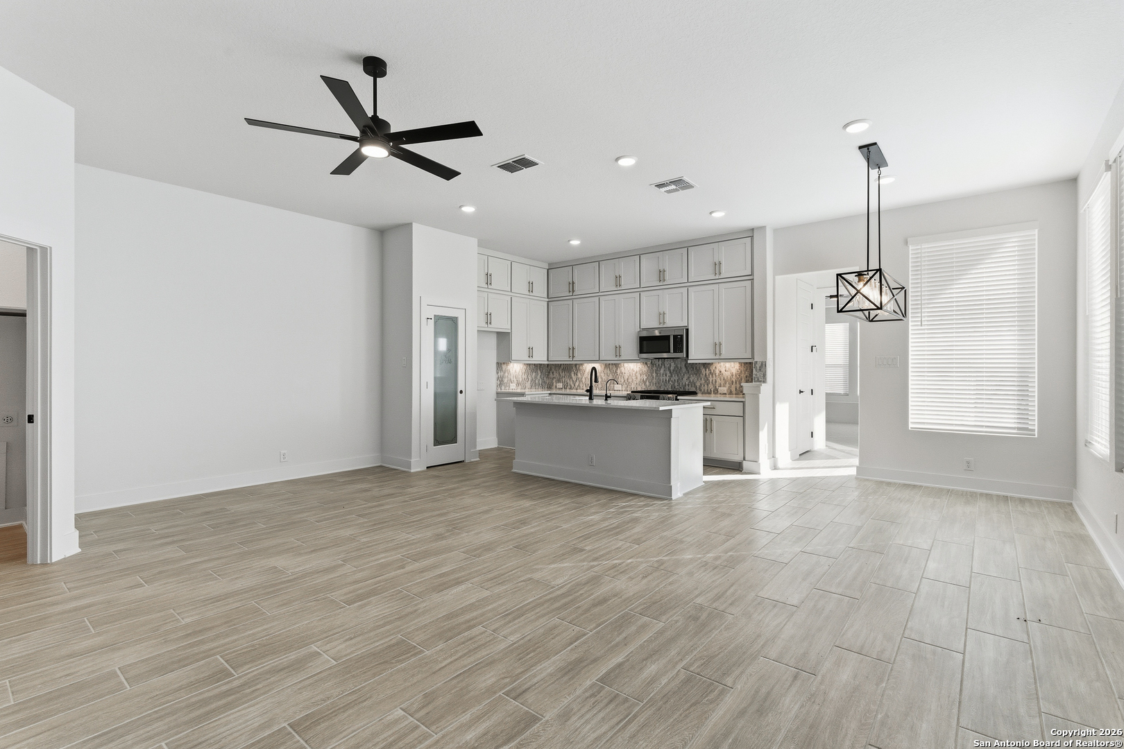 20675 Huebner Road, Unit 527 San Antonio, TX 78258 - Photo 10 of 43 a view of a kitchen with a sink stainless steel appliances and cabinets