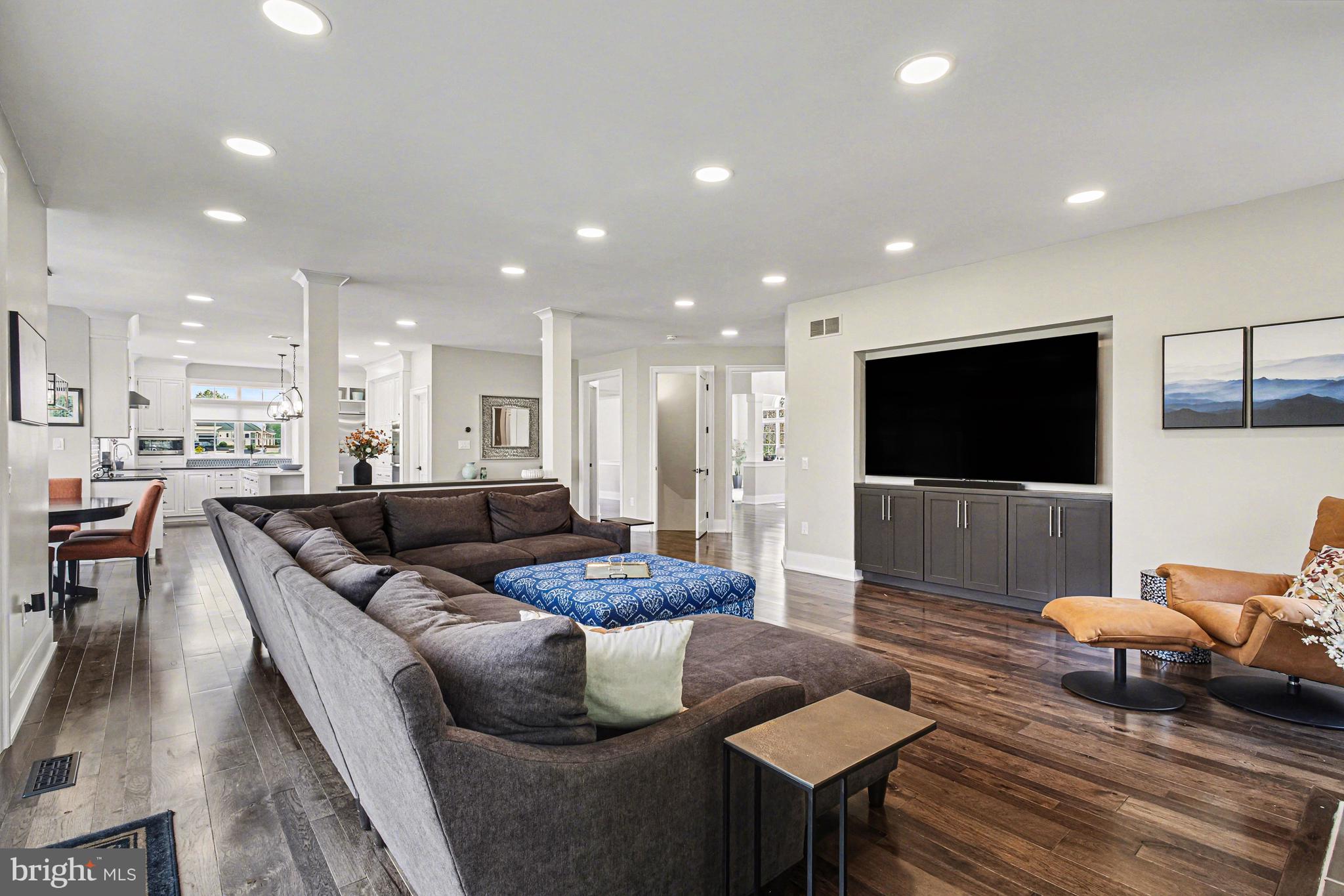 671 Bent Creek Drive Lititz, PA 17543 - Photo 11 of 61 a living room with furniture and a flat screen tv