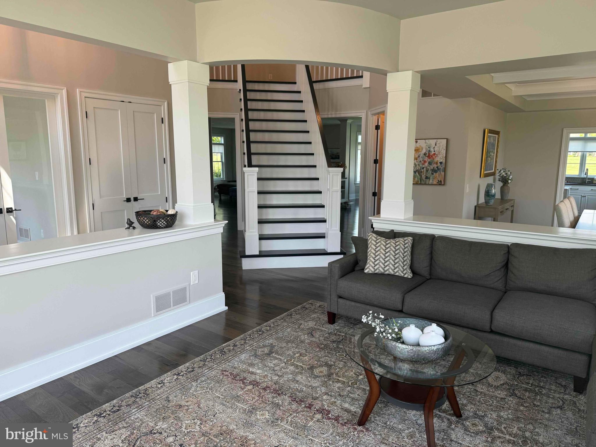 671 Bent Creek Drive Lititz, PA 17543 - Photo 17 of 61 a living room with furniture and a wooden floor