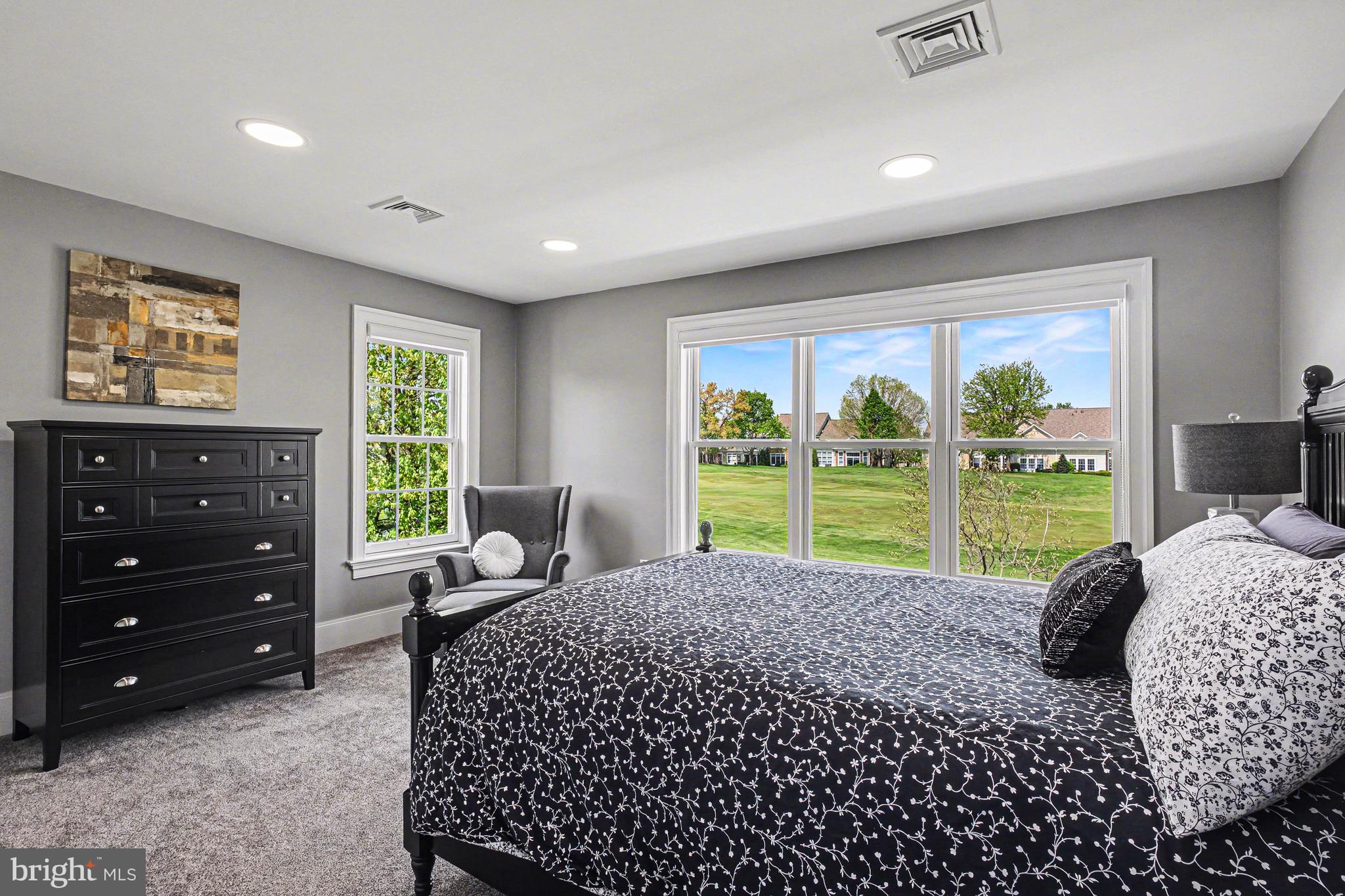 671 Bent Creek Drive Lititz, PA 17543 - Photo 30 of 61 a bed room with a bed and a chair