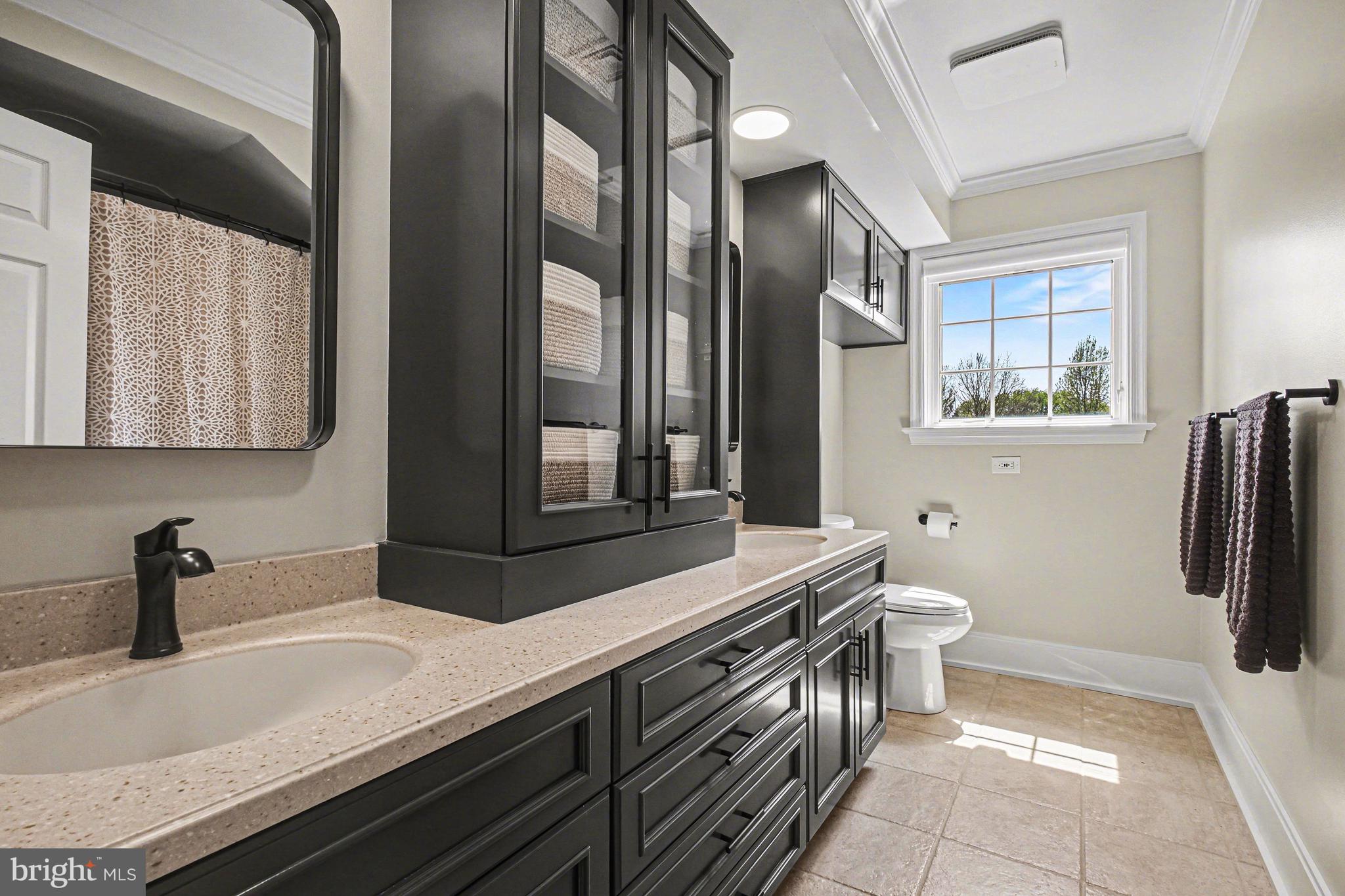 671 Bent Creek Drive Lititz, PA 17543 - Photo 31 of 61 a bathroom with a sink and a mirror