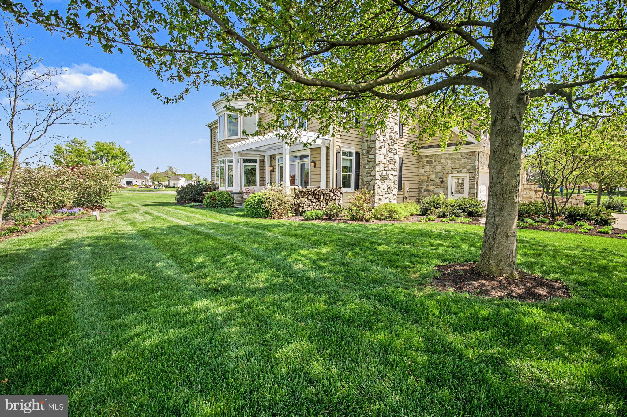 671 Bent Creek Drive Lititz, PA 17543 - Photo 44 of 61 a front view of a house with garden