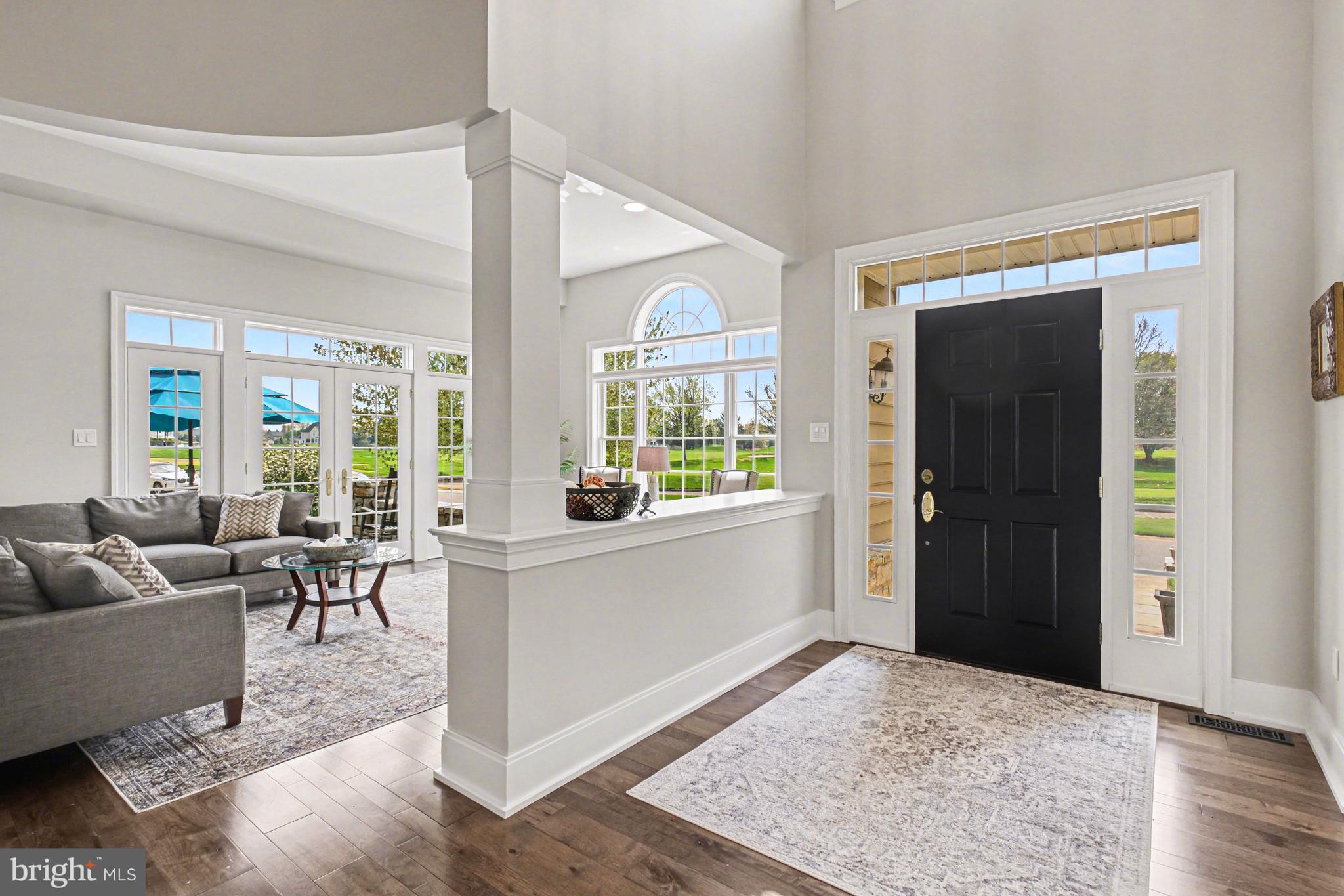 671 Bent Creek Drive Lititz, PA 17543 - Photo 6 of 61 a living room with furniture and a large window