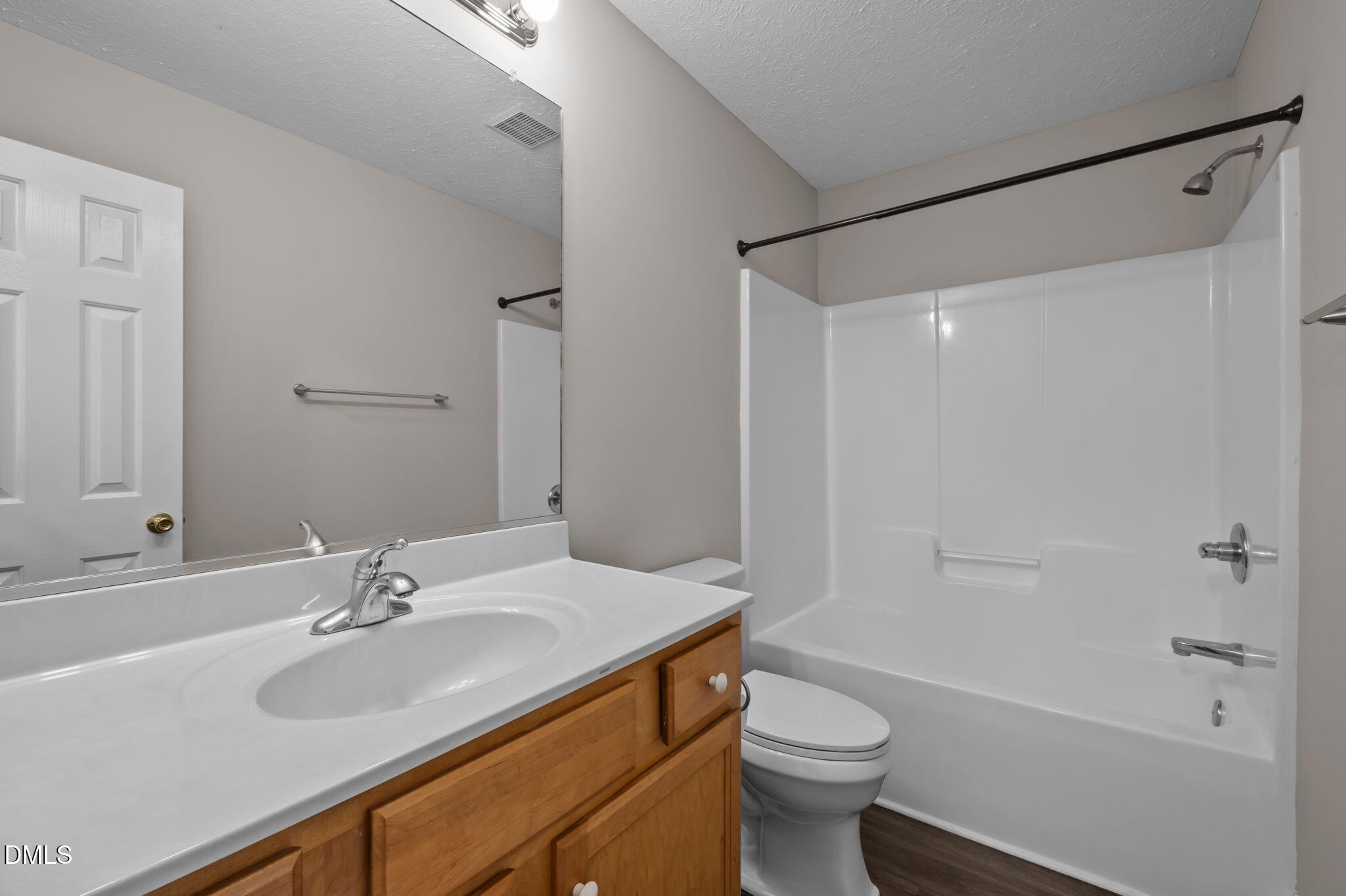 427 Fletcher Ridge Road Timberlake, NC 27583 - Photo 27 of 42 a bathroom with a sink toilet and shower