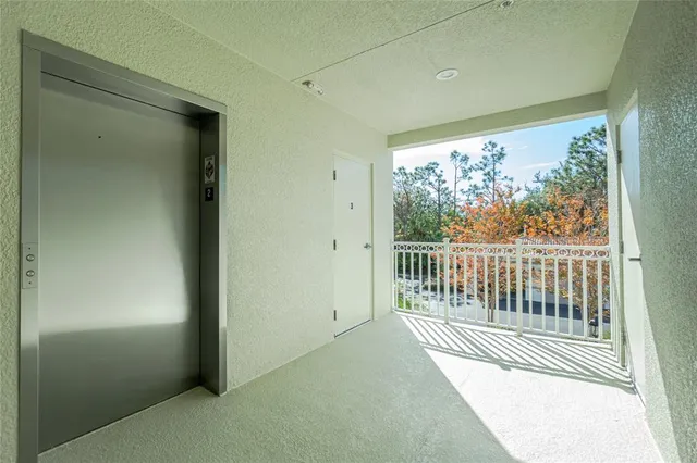 a view of a street with cars