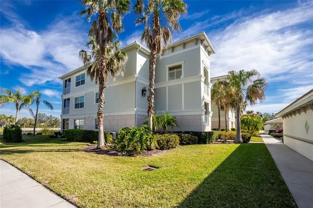 a view of a building with a yard