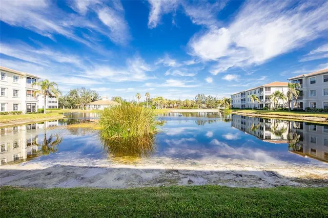 a view of a building with a yard