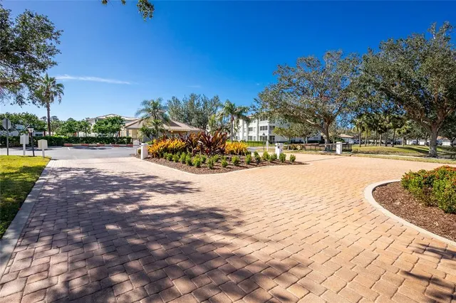 a view of outdoor space pool patio and garden