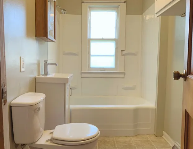 a view of a back yard with green space