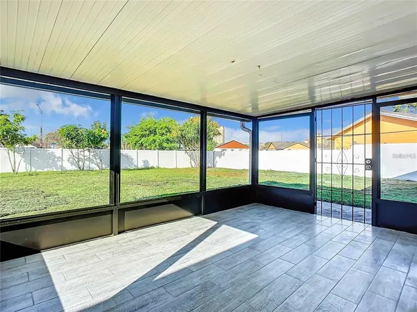 a view of a swimming pool with a yard