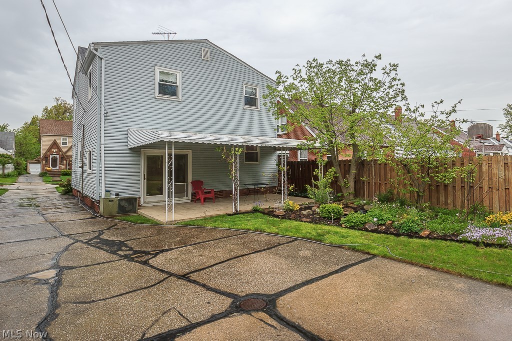 1271 Avondale Road Cleveland, OH 44121 - Photo 2 of 35 Covered patio over looking landscaped yard.