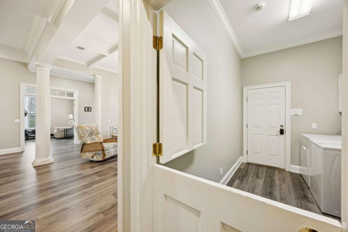 343 Major Wright Road St. Simons, GA 31522 - Photo 34 of 53 a view of living room with furniture and wooden floor